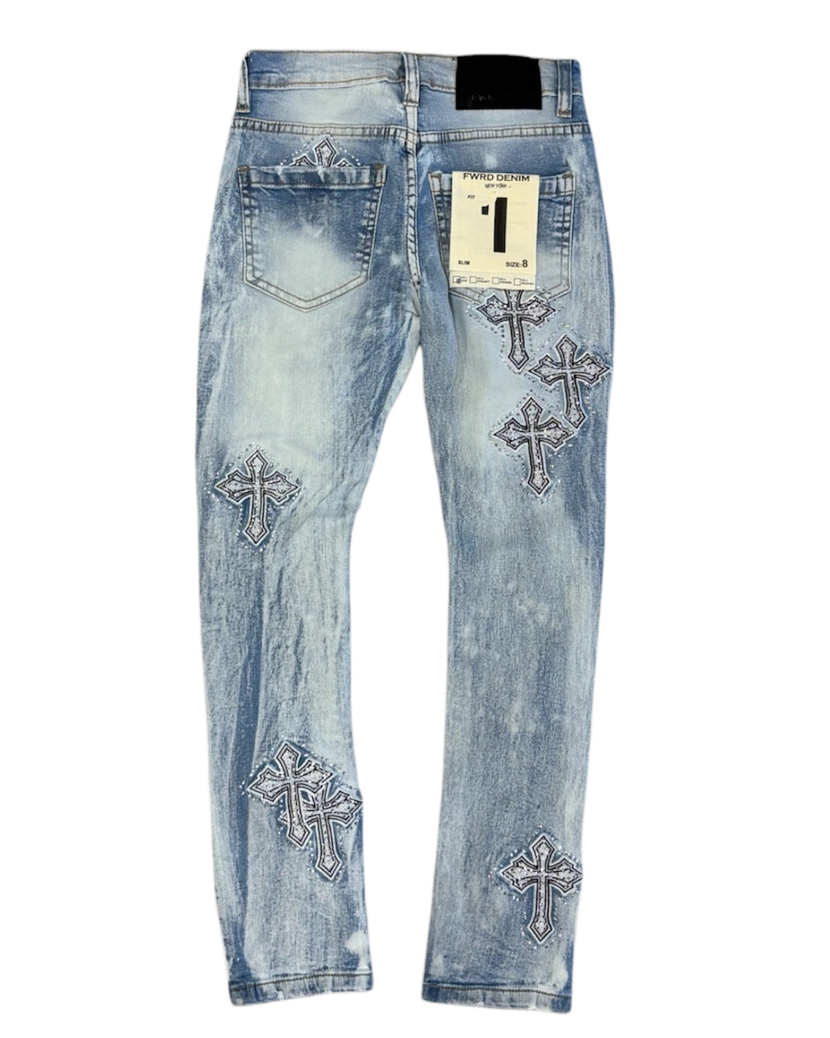 Blue jeans with cross designs on a white background