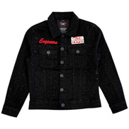 Black denim jacket with embroidered patches on a white background