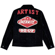 Black speckled jacket with red and white text on a white background