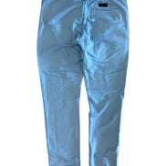 Light blue pants with a white waistband on a white background
