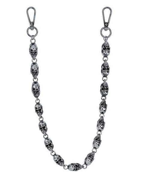Silver chain with skull designs on a white background