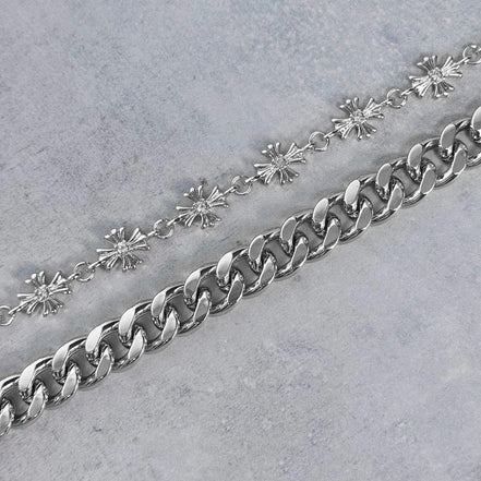silver chain on a gray surface