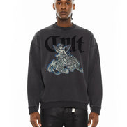 Person wearing a black sweatshirt with a graphic design on a white background