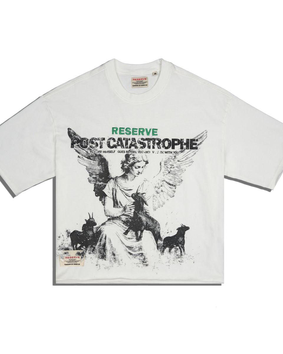 white graphic tee featuring an angelic winged figure petting goats and green and black text
