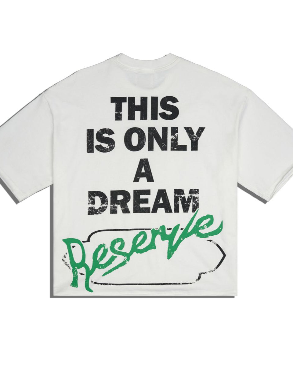 back of white graphic tee with black and green text