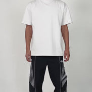 model wearing the black variant of the Roundy pants by the brand EPTM. Chill posing and styling.