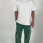 model wearing the hunter green menlo nylon pants