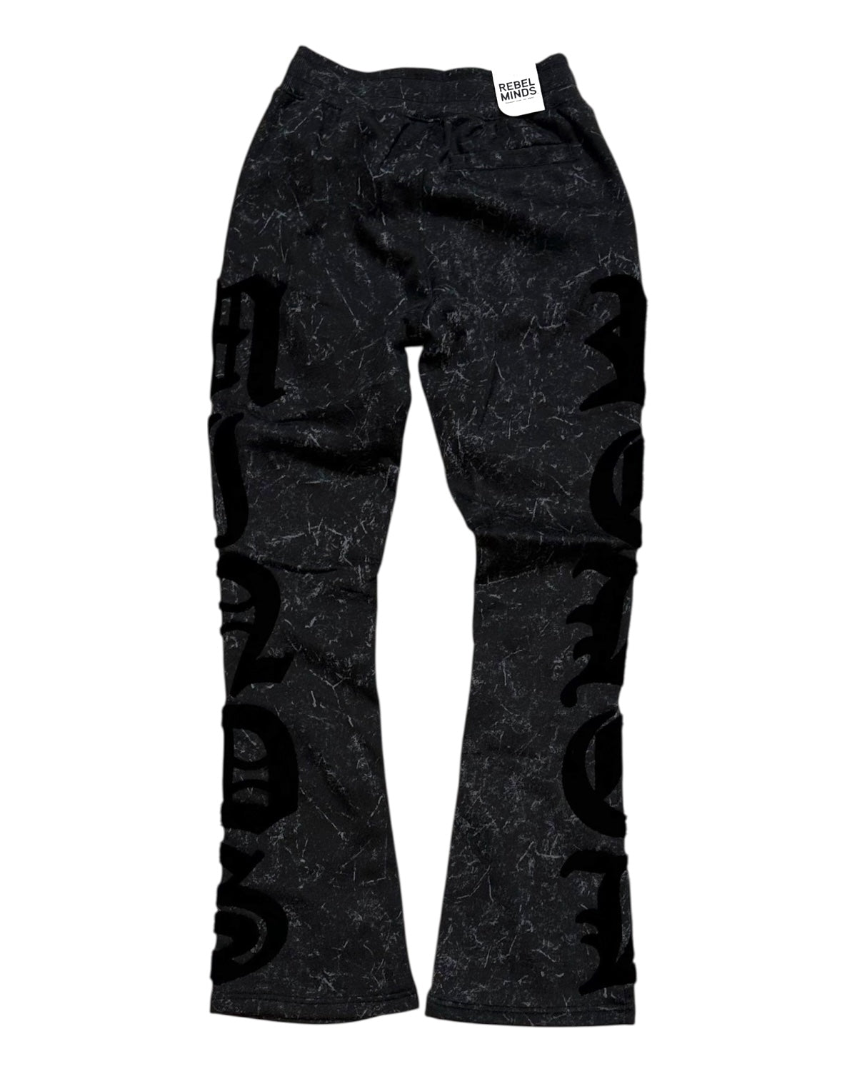 Black patterned pants on a white background
