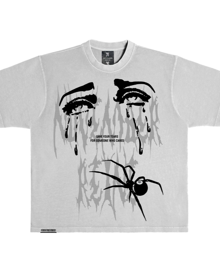 Gray t-shirt with black graphic design of a face crying and a spider on a white background