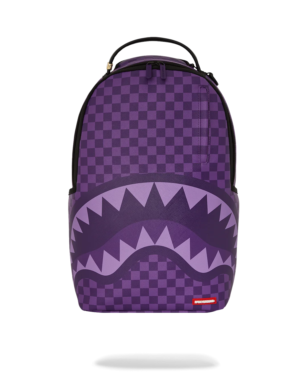Purple checkered backpack with shark mouth design on a white background by sprayground