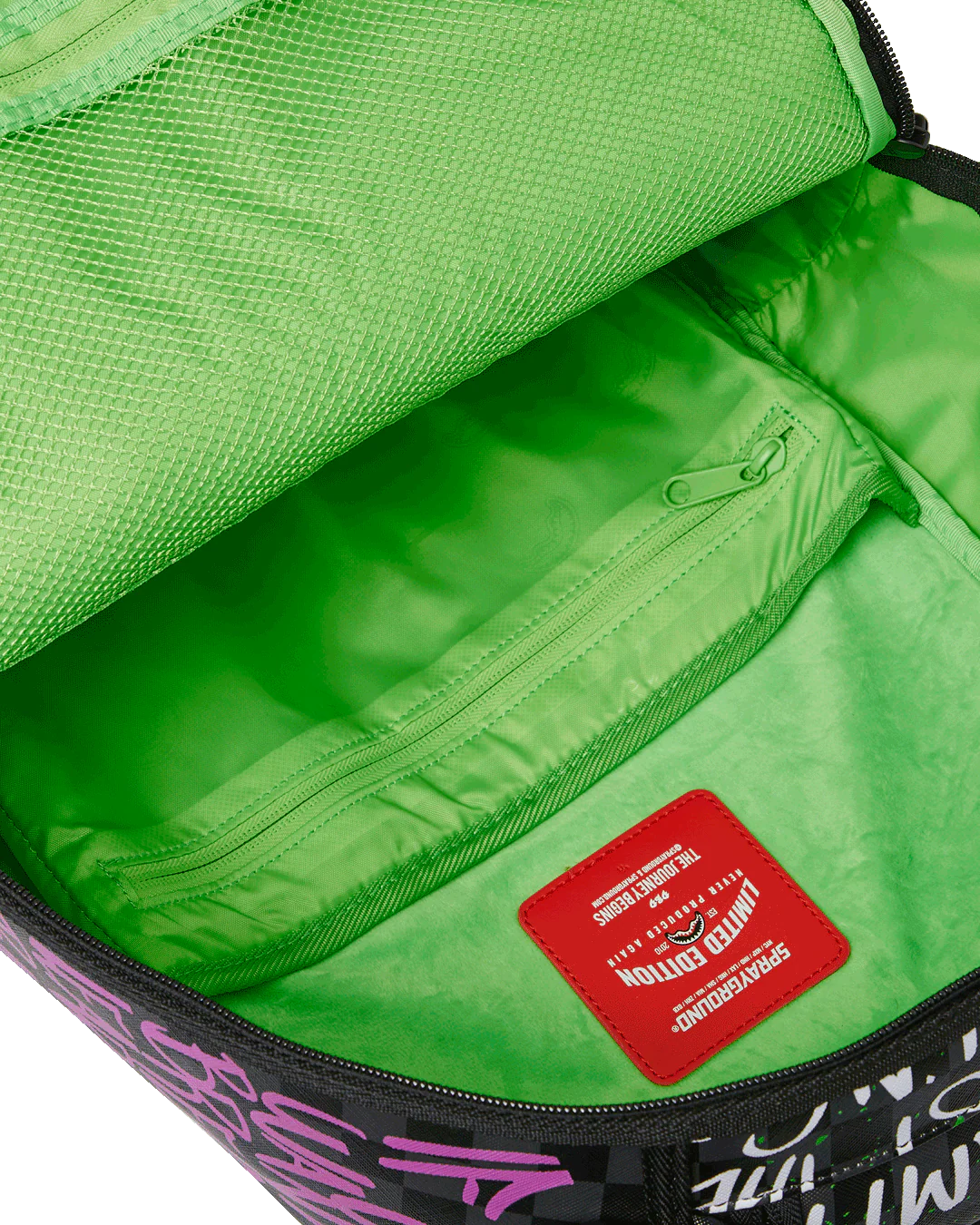Green bag interior with a red label on a white background