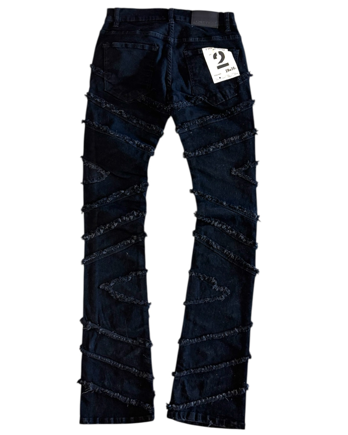 black jeans with decorative elements on a white background