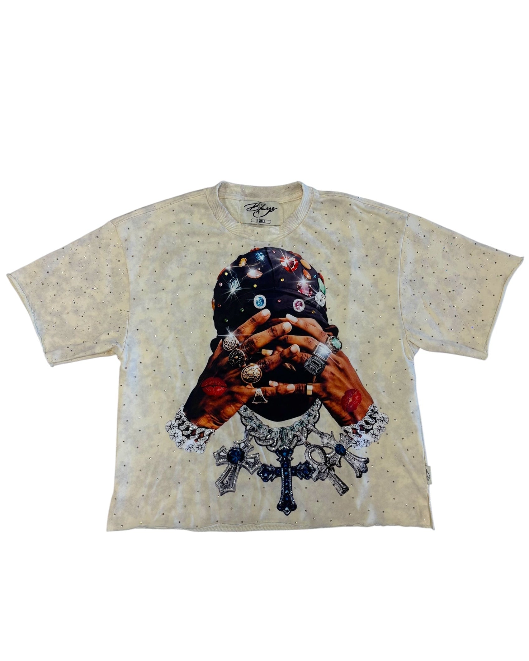 Beige t-shirt with a graphic design of a person holding a globe on a white background