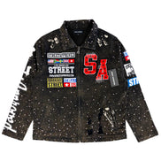 Black jacket with colorful patches and text on a white background