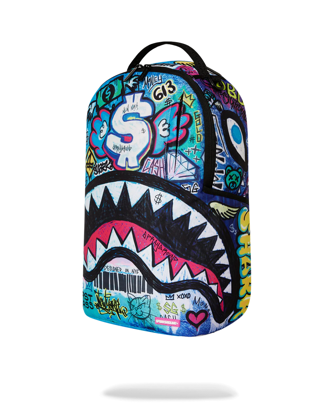 Colorful sprayground backpack with shark design and graffiti-style text on a white background
