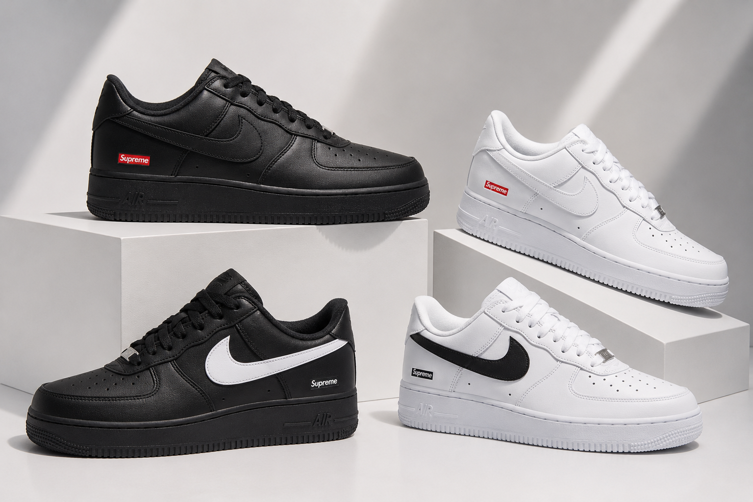 Four pairs of black and white sneakers on a light gray background