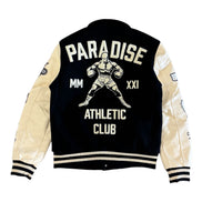 Black and beige varsity jacket with 'Paradise Athletic Club' text and graphic on a white background