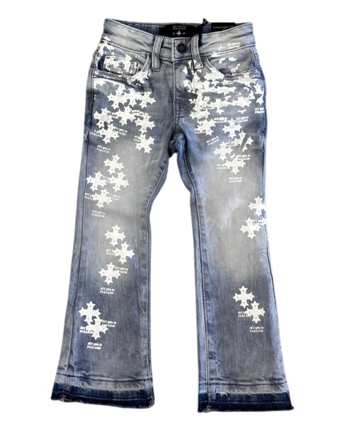 Blue jeans with white puzzle piece design on a white background