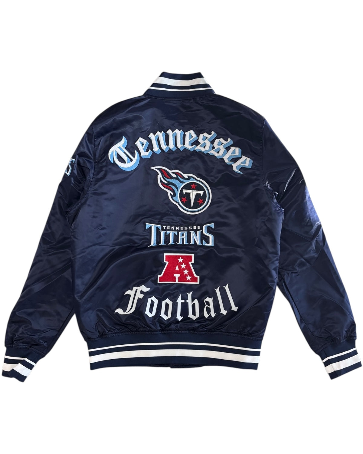 Navy blue jacket with Tennessee Titans logo and text on a white background