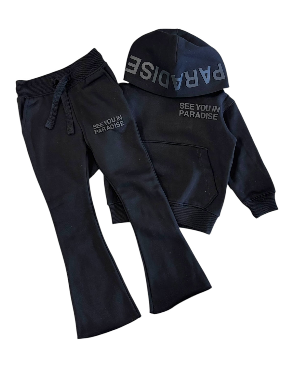 Black hoodie and pants set with 'See You in Paradise' text on a white background