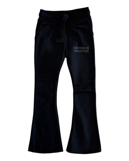 Black pants with 'SEE YOU IN PARADISE' text on a white background