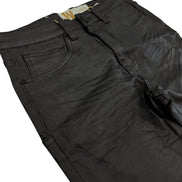 Black pants with a brand tag on a white background