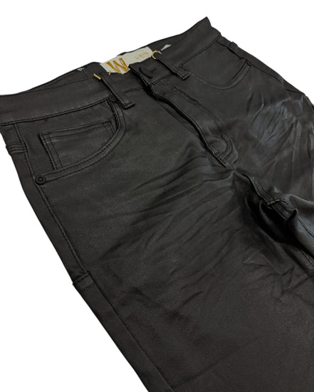 Black pants with a brand tag on a white background