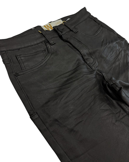 Black pants with a brand tag on a white background
