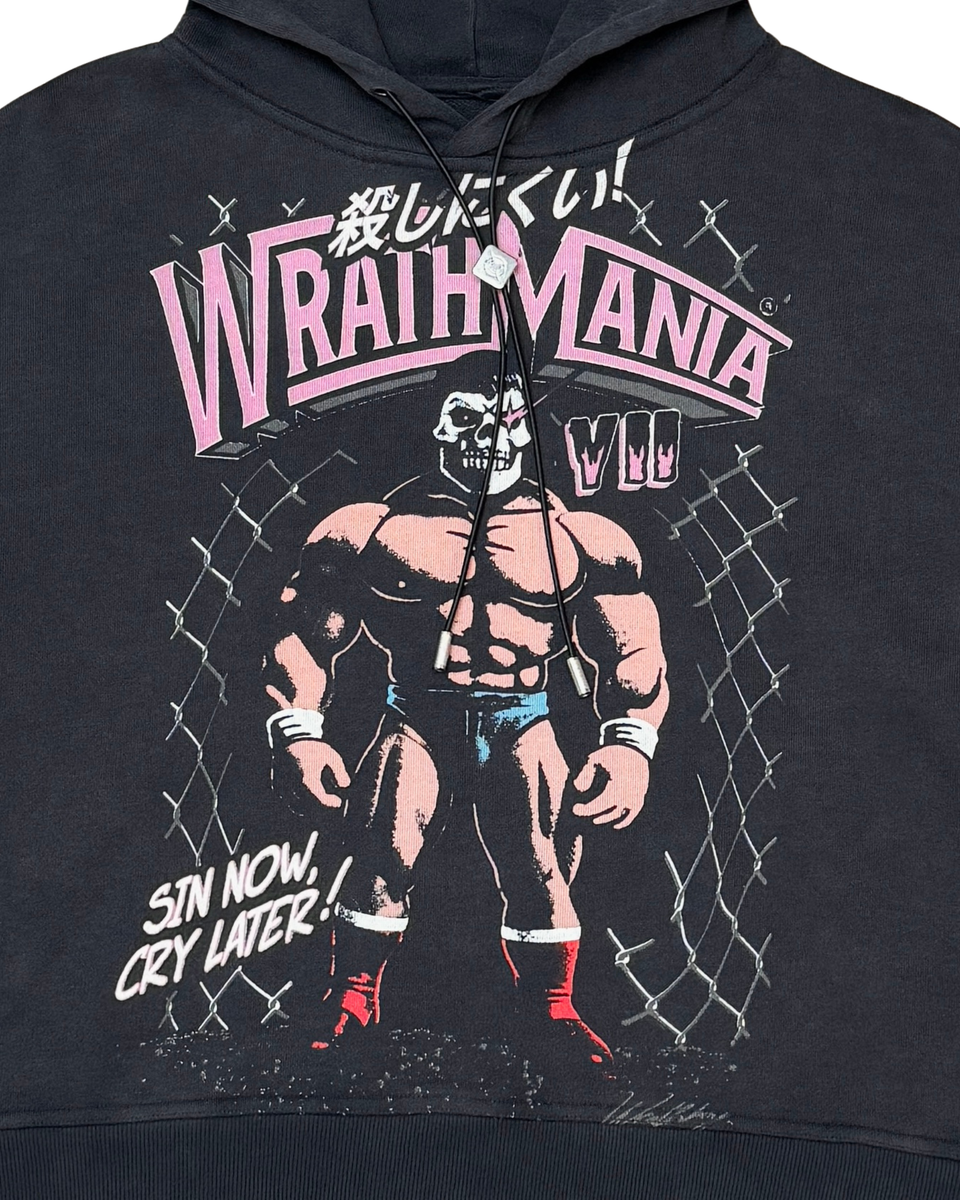 Black hoodie with graphic design of a masked figure and text on a white background