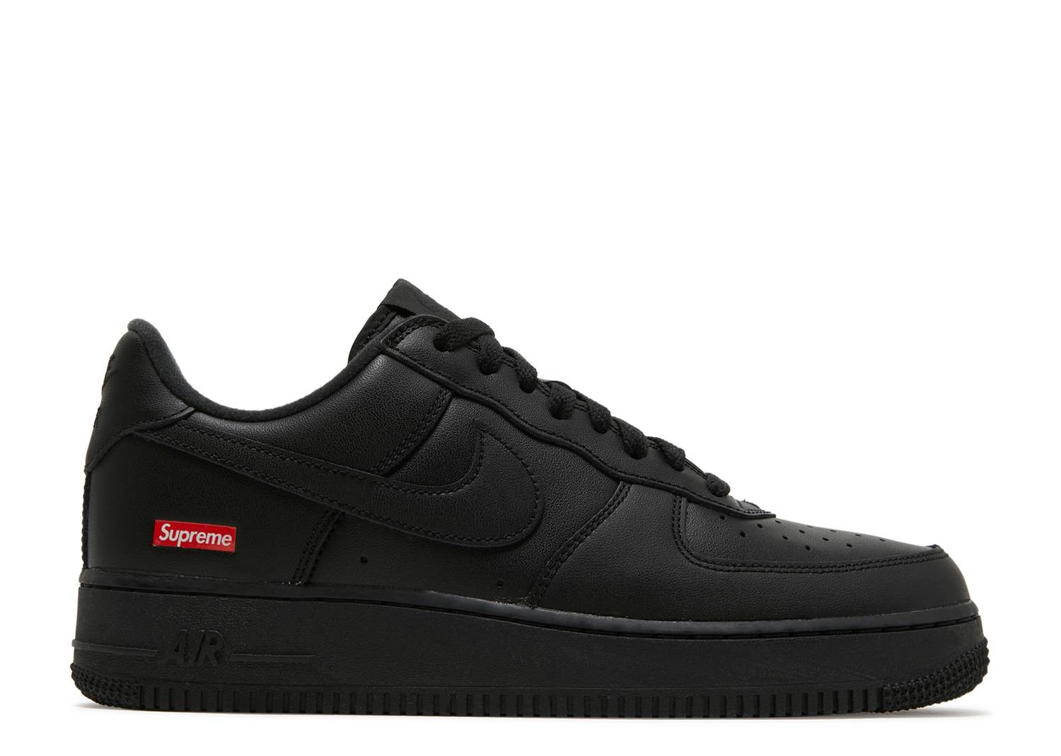 A pair of black Nike Air Force 1 Low sneakers with Supreme branding on the laces and heel tab.